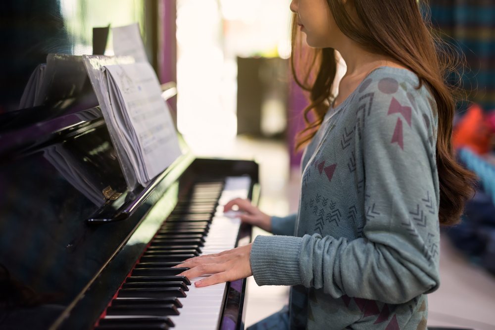 woman pianist play classic Piano